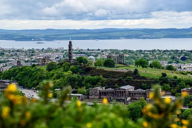 Calton Hill in Edinburgh with the Firth of Forth beyond